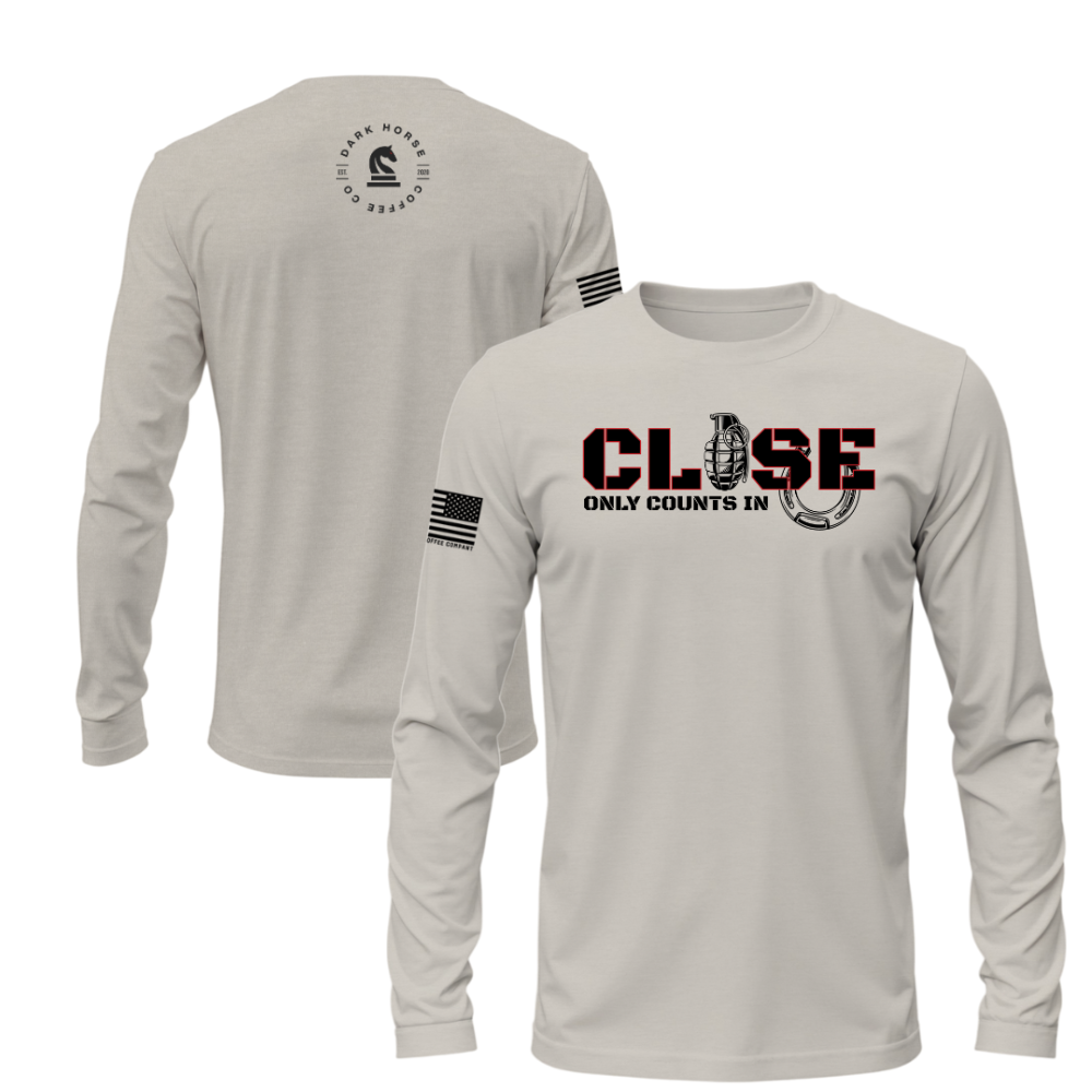 Hand Grenades & Horseshoes long sleeve shirt in sandstone featuring “Close Only Counts In” design with grenade and horseshoe graphics.