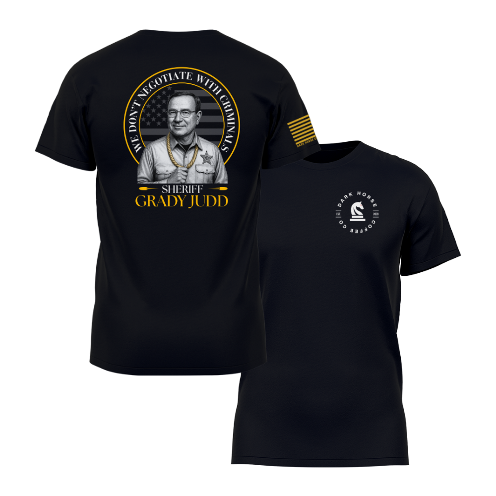 Black graphic t-shirt with patriotic law-and-order quote and illustrated portrait on the back, and Dark Horse Coffee Company logo on the front.