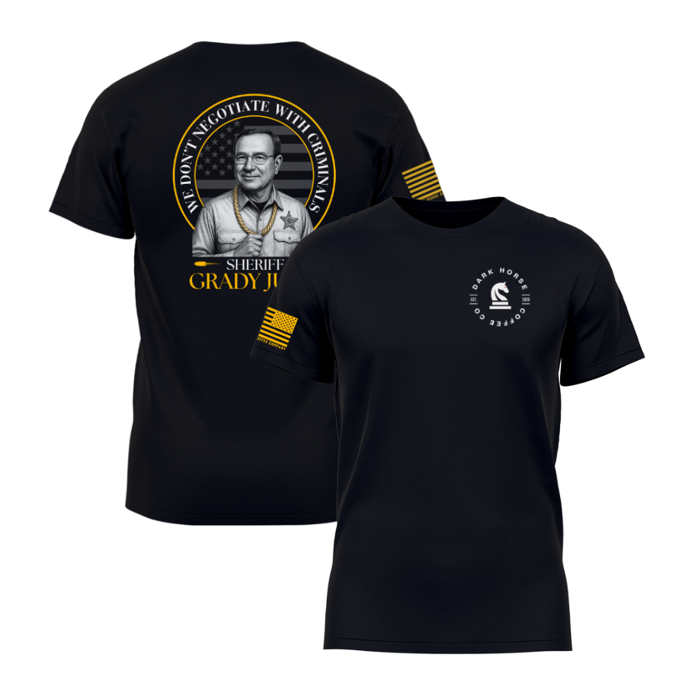 Black graphic t-shirt with patriotic law-and-order quote and illustrated portrait on the back, and Dark Horse Coffee Company logo on the front.