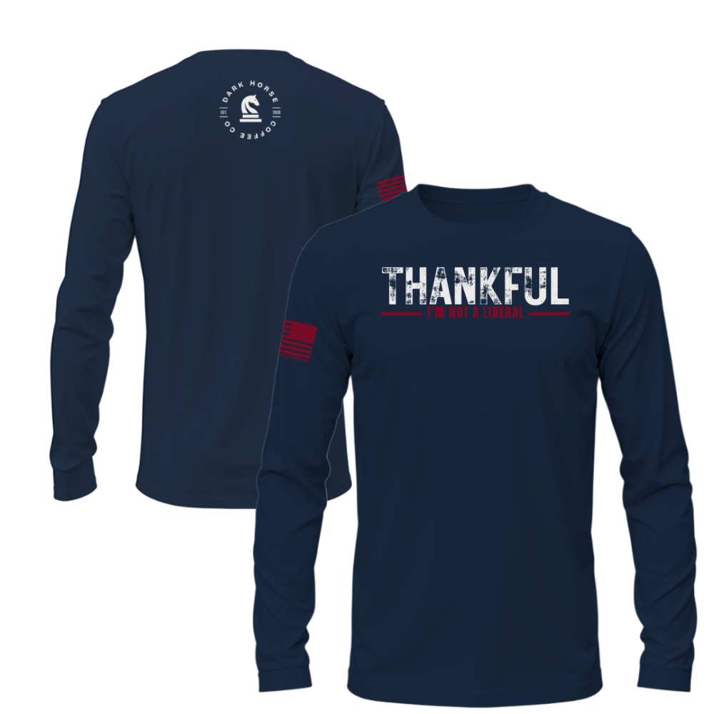 Navy long sleeve shirt with “Thankful I’m Not a Liberal” white and red graphic, American flag sleeve, and Dark Horse Coffee Co. back logo.